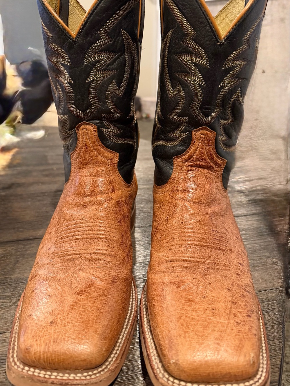 Justin Smooth Ostrich skin Boots with Leather Black and tan uppers. 10 1/2d